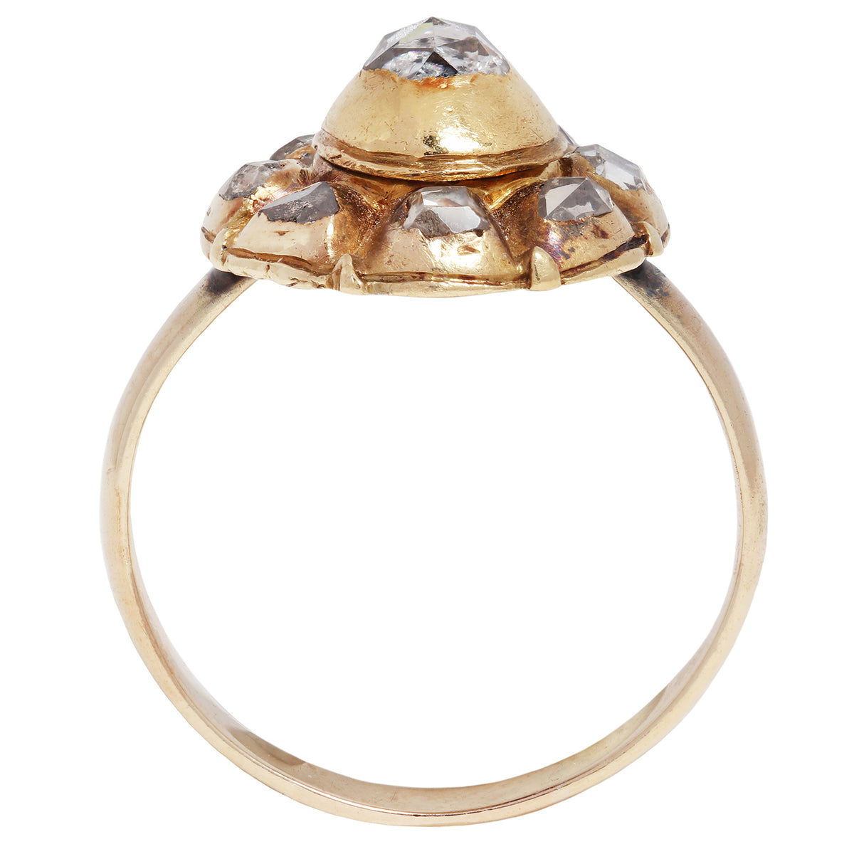 antique gold ring with embedded diamonds on a white background