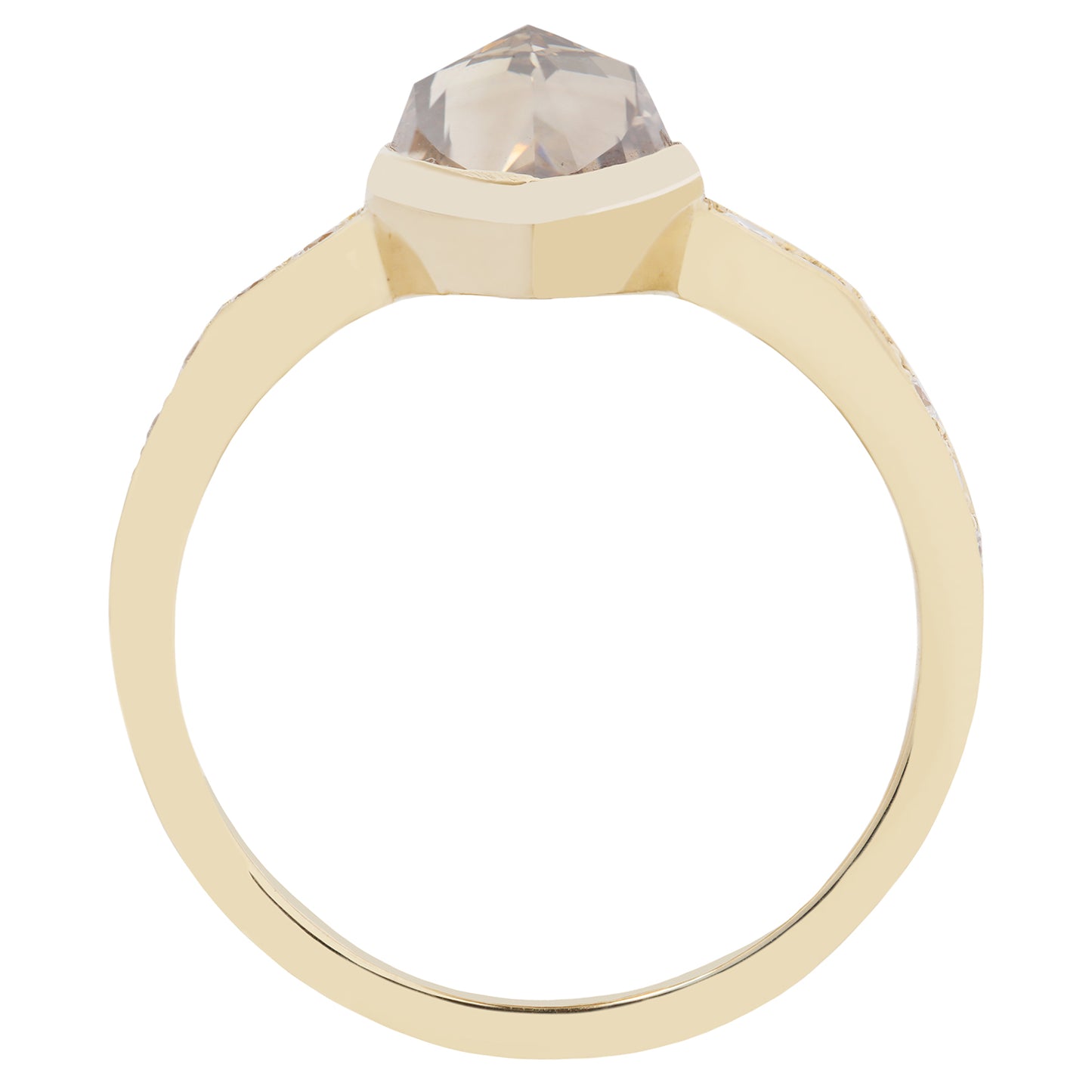 Gold ring with a clear gemstone on a white background