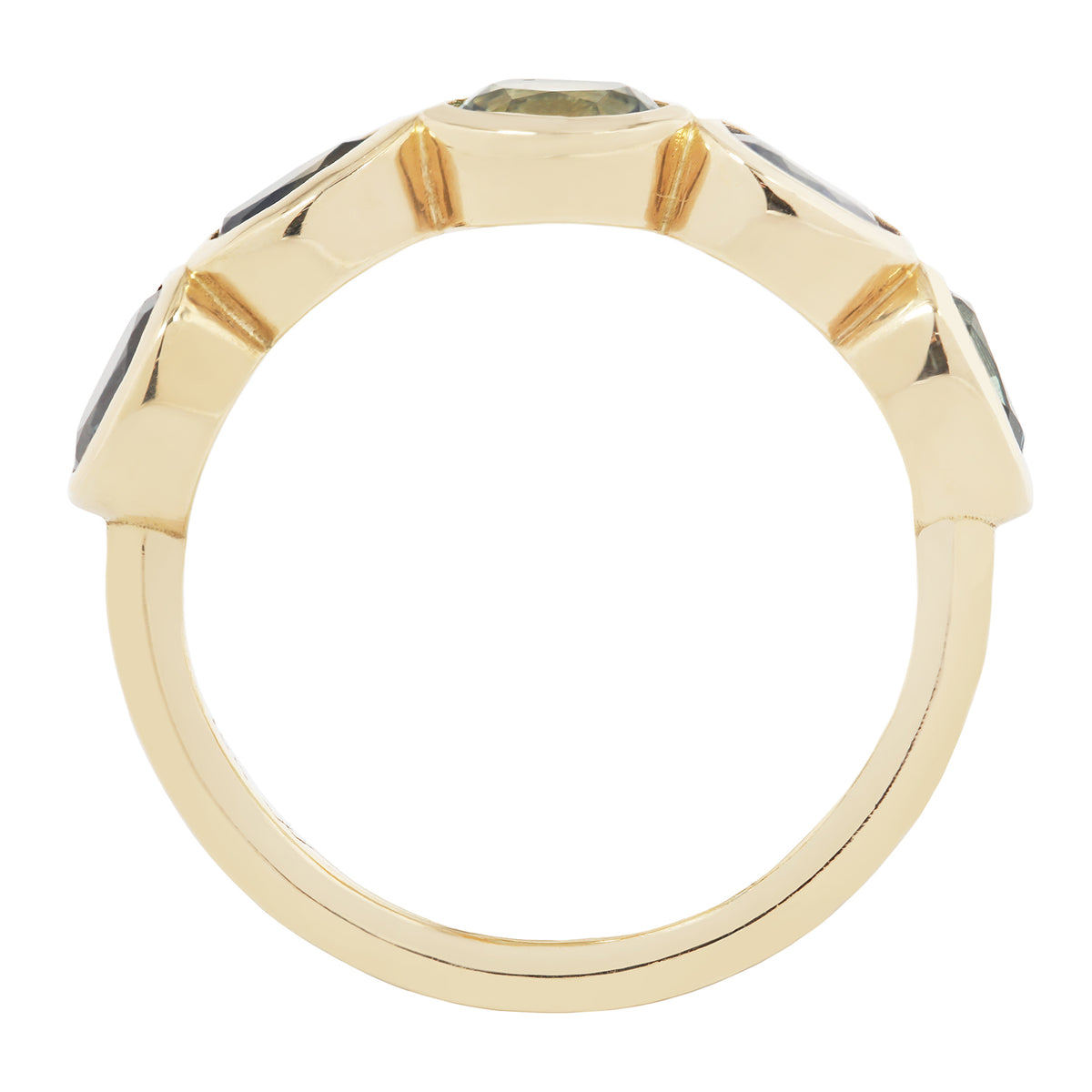 Gold ring with gemstones on a white background