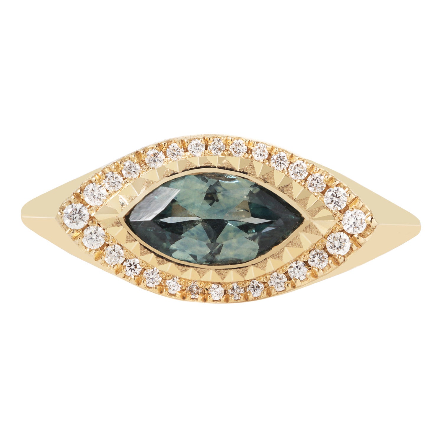 A deco-inspired signet ring with a custom cut Montana sapphire in a hand-cut geometric bezel, surrounded by white diamonds, set in 14k yellow gold.
