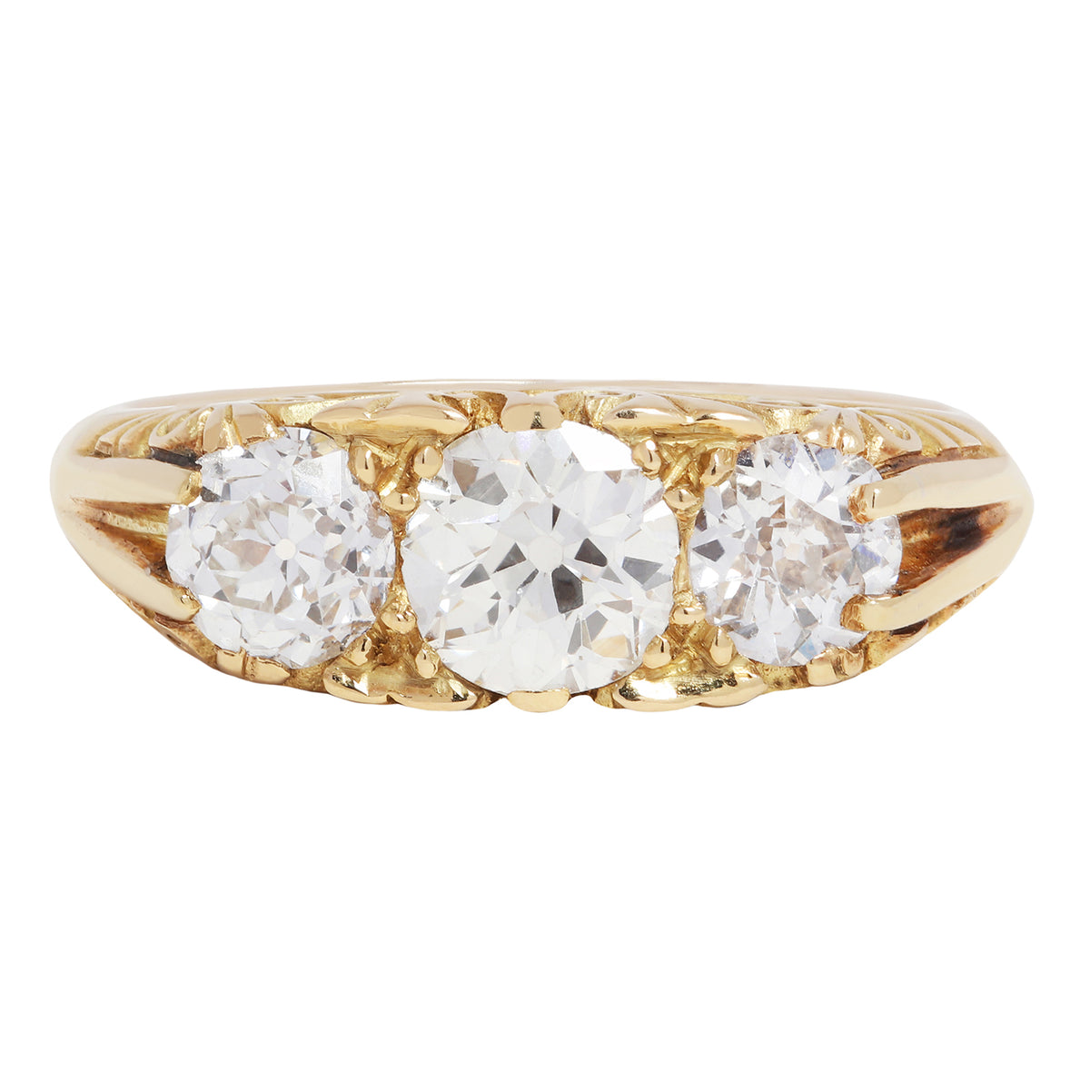 antique old ring with three diamonds on a white background