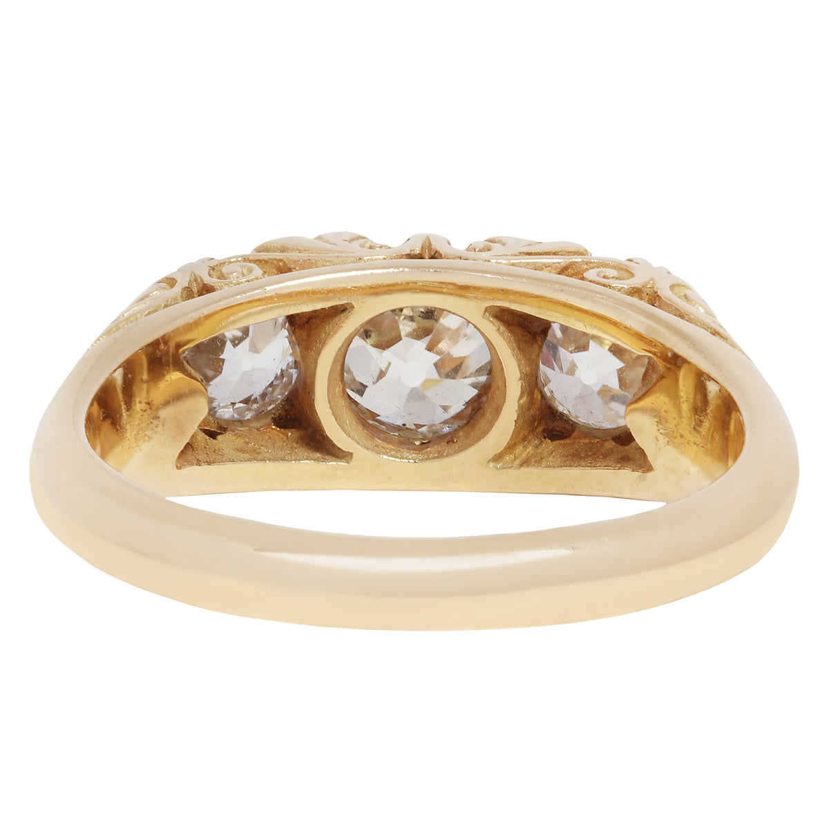 antique old ring with three diamonds on a white background