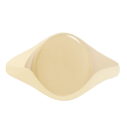 A minimalist signet-style ring with a smooth, rounded diamond-shaped face and a wide, tapered band, shown in a warm cream or pale gold tone against a plain white background.
