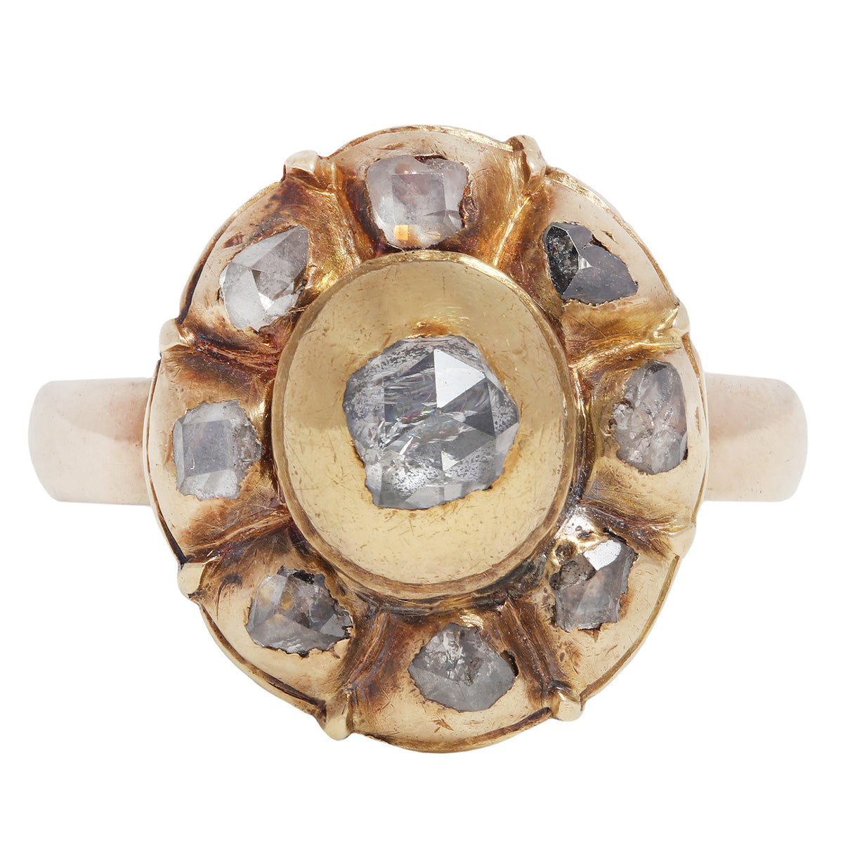 antique gold ring with embedded diamonds on a white background