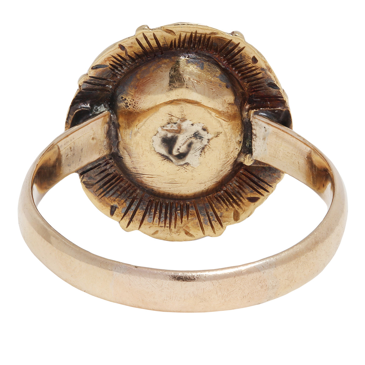 antique gold ring with embedded diamonds on a white background