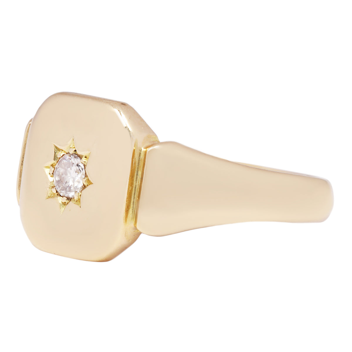 Antique - Gold ring with a diamond on a white background