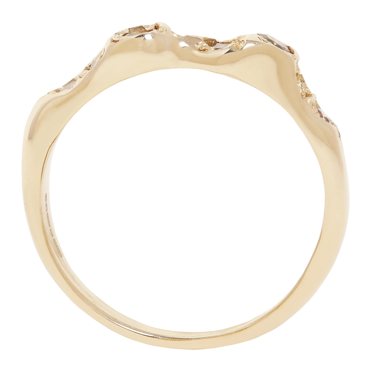 A gold ring with an organic, wavy, undulating top surface, photographed against a solid white background.