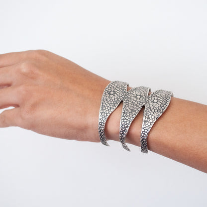 Stingray Triple Cuff by Lauren Wolf Jewelry shown worn on the wrist