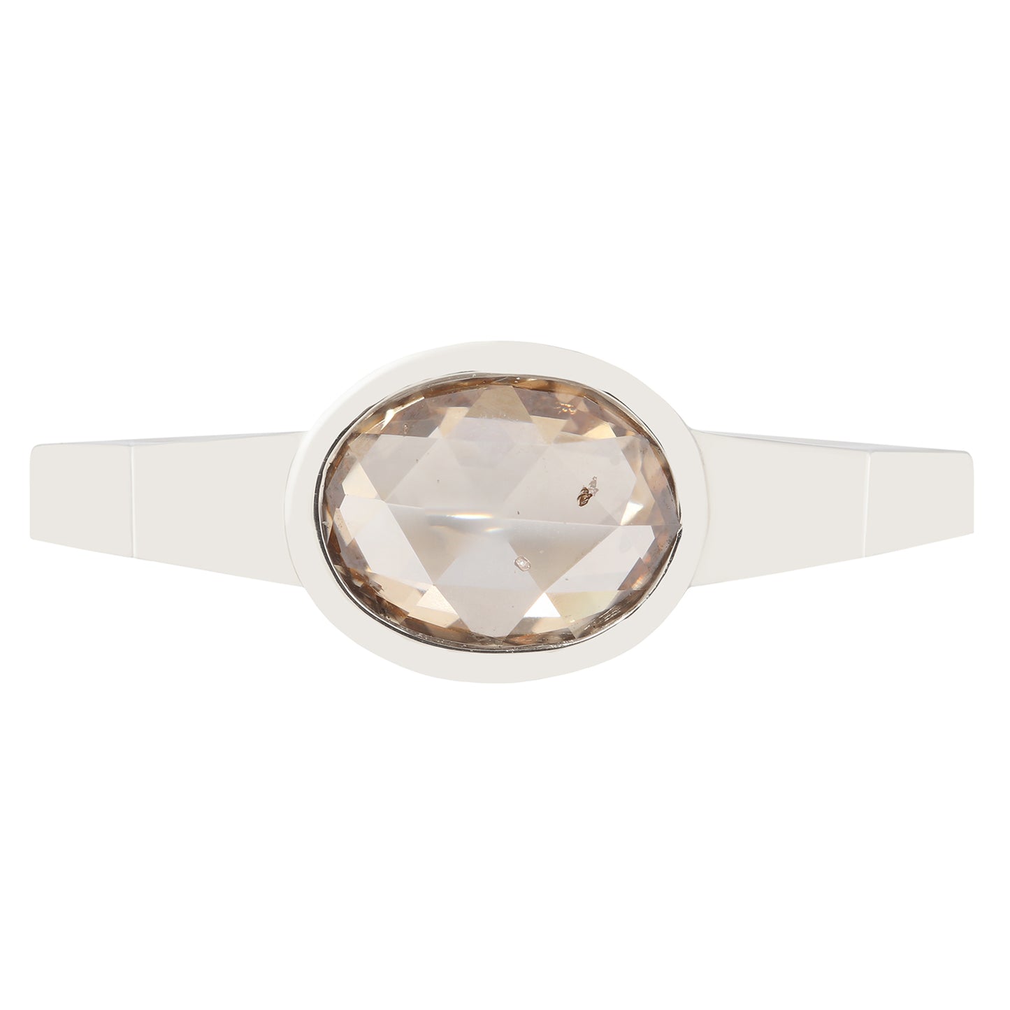 Ring with a large faceted gemstone on a white background