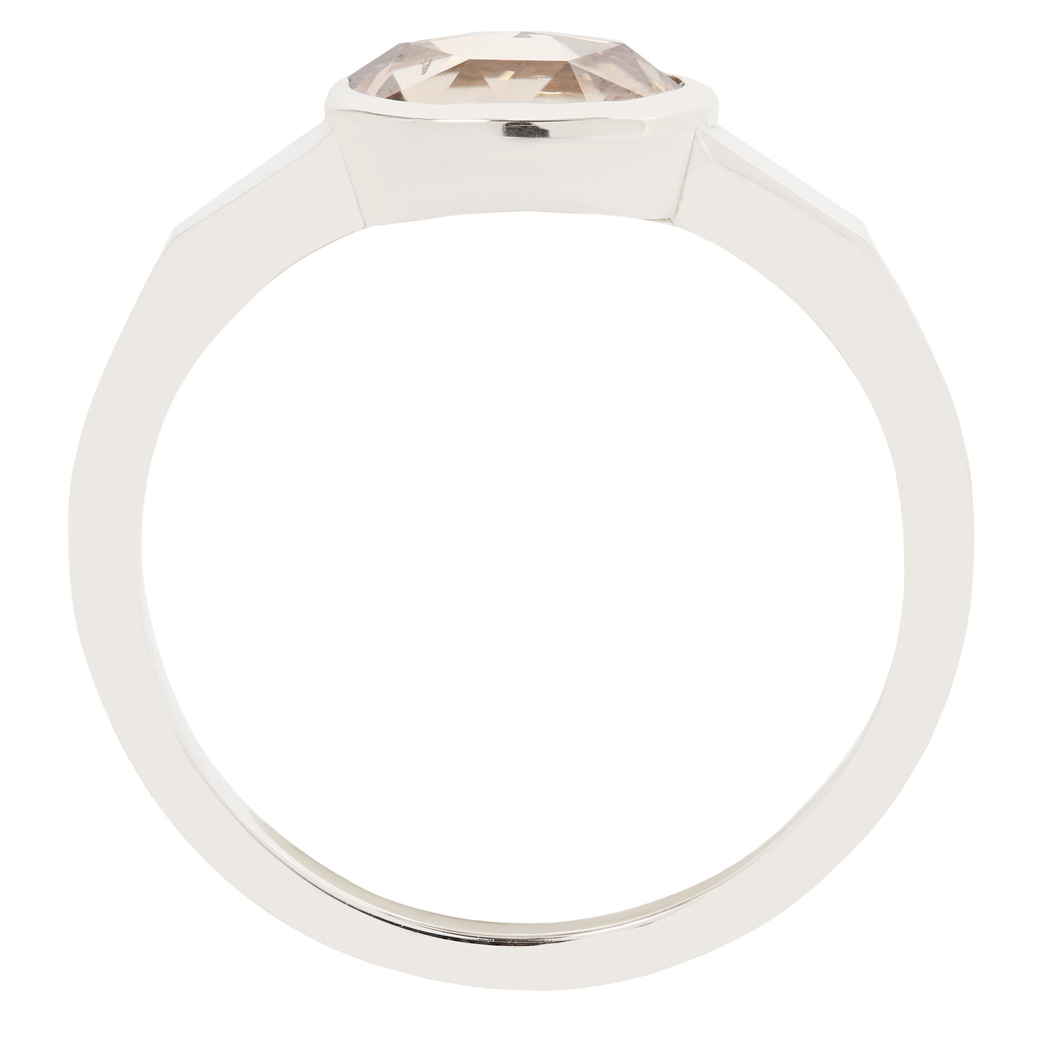 White gold ring with a clear gemstone on a white background