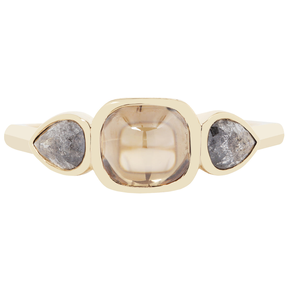 Gold ring with three stones on a white background