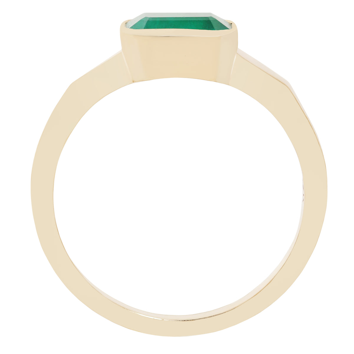 A yellow gold ring featuring a rectangular green gemstone in a bezel setting, shown against a plain white background.