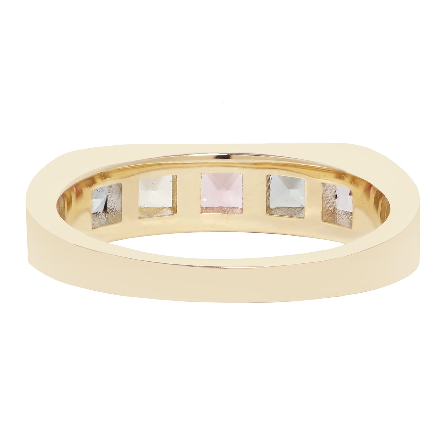 A gold ring with five square-cut gemstones set in a row on the inside, shown against a plain white background.