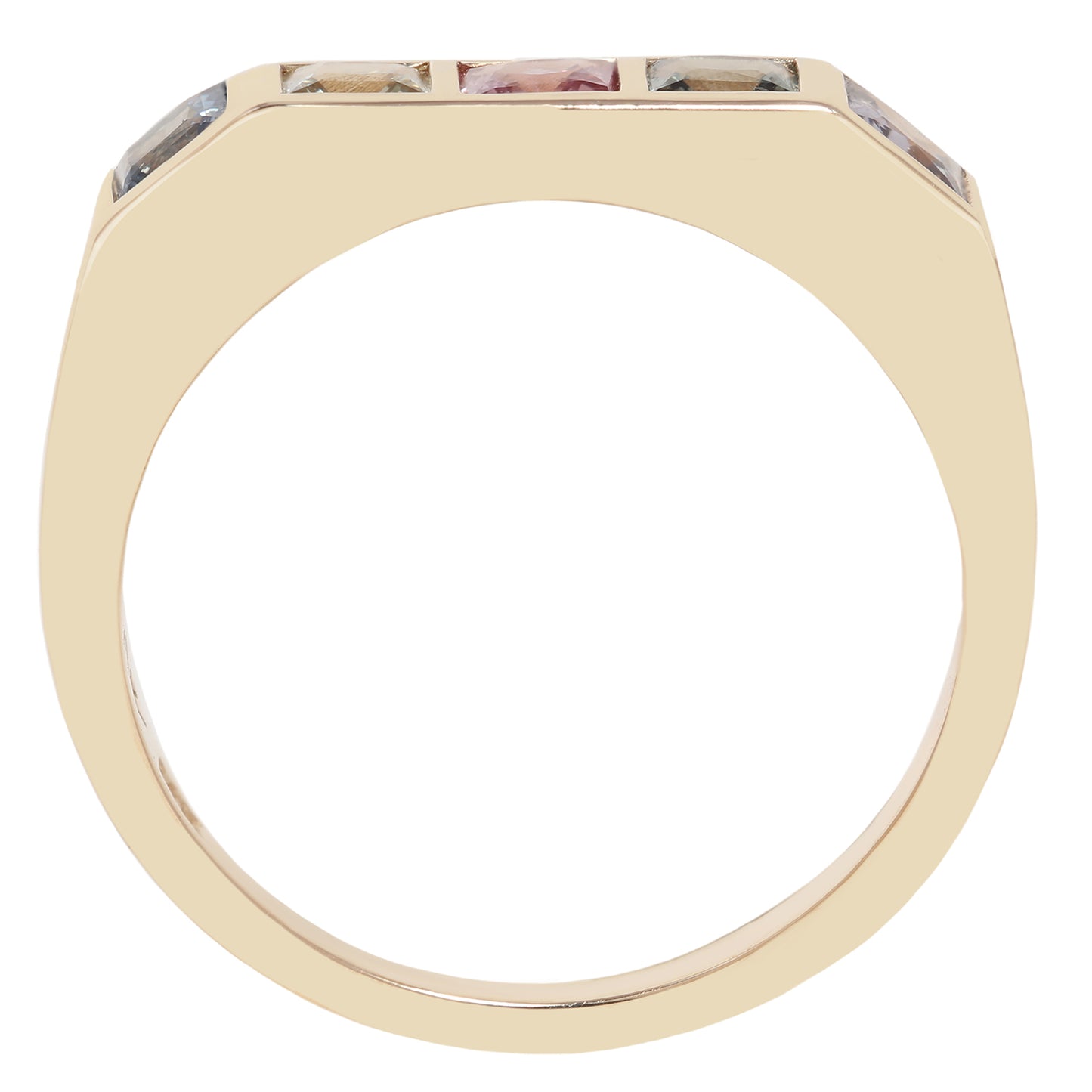 A gold ring with a wide, rounded band and a top setting featuring three small rectangular gemstones in different colors, shown against a plain white background.