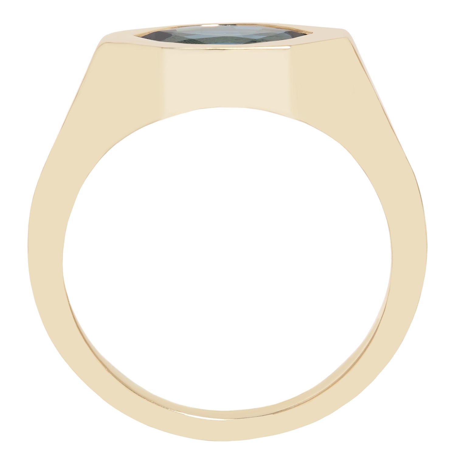 A gold ring with a wide, polished band and a small oval dark gray gemstone set in a square bezel, shown against a plain white background.