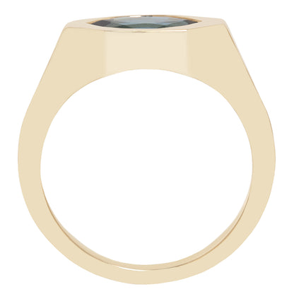A gold ring with a wide, polished band and a small oval dark gray gemstone set in a square bezel, shown against a plain white background.
