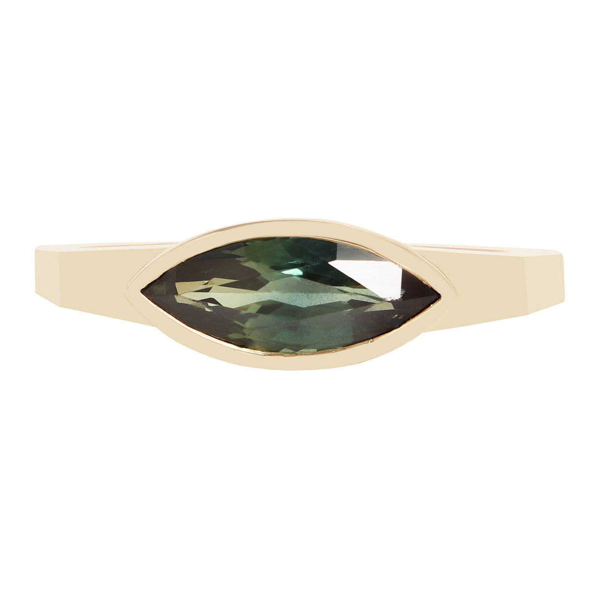 A gold ring featuring a marquise-cut green gemstone in a bezel setting, shown against a plain white background.