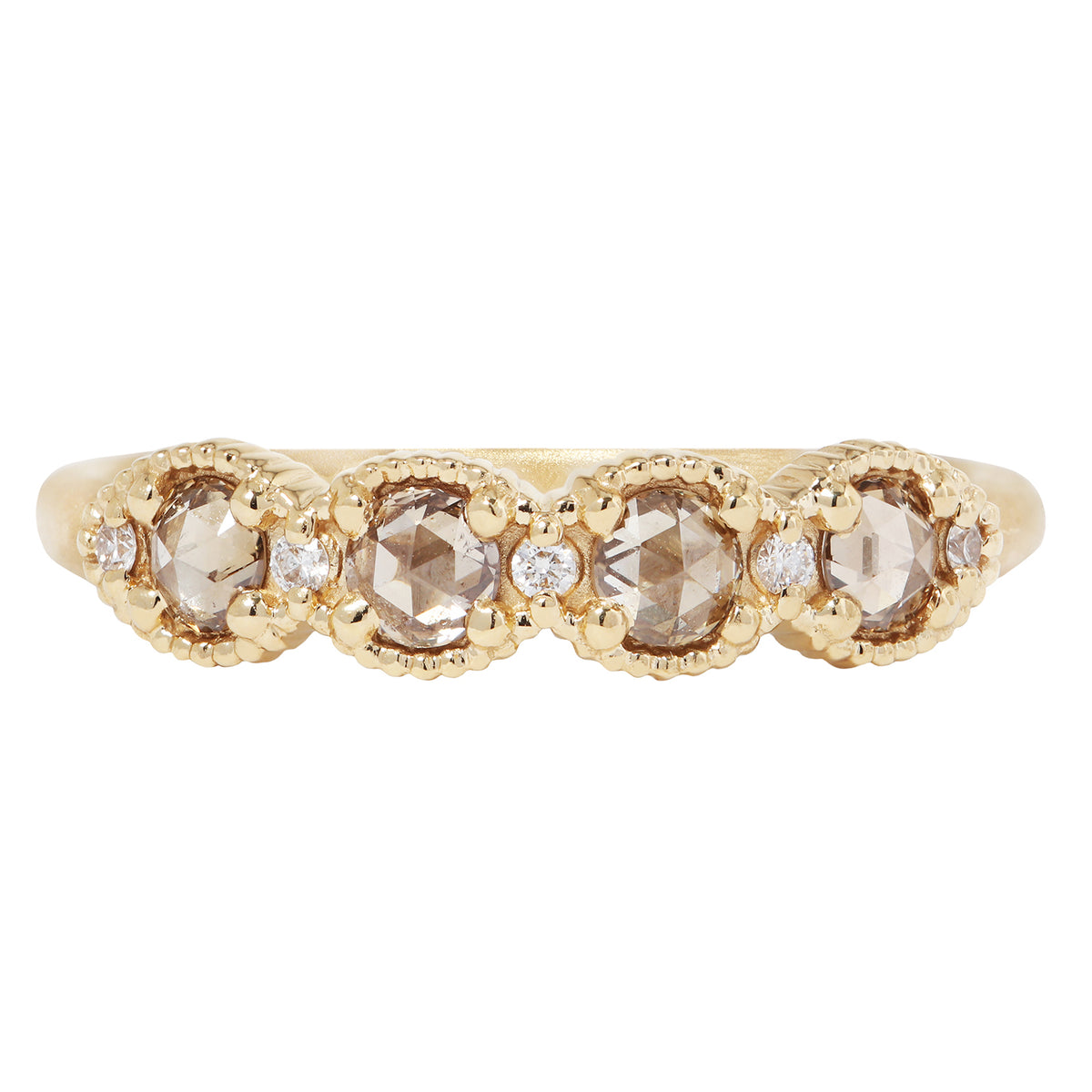 Gold ring with rose-cut diamonds on a white background