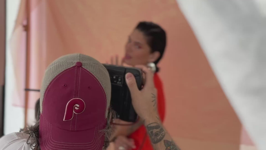 behind-the-scenes video of a jewelry photoshoot with model and photograper