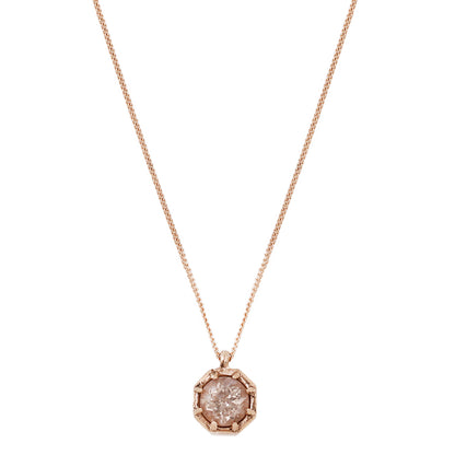  Lauren Wolf’s pink morganite necklace on a white backdrop