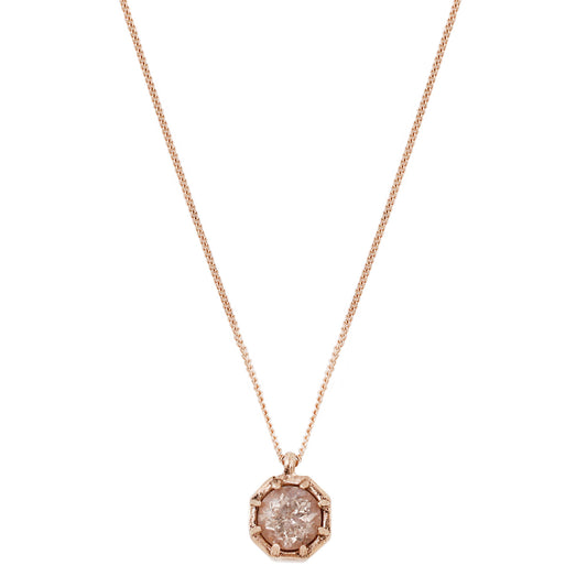  Lauren Wolf’s pink morganite necklace on a white backdrop