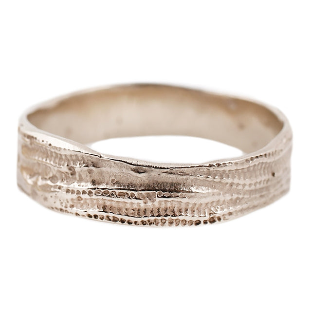 Lauren Wolf - White Gold ring with urchin texture design on a white background