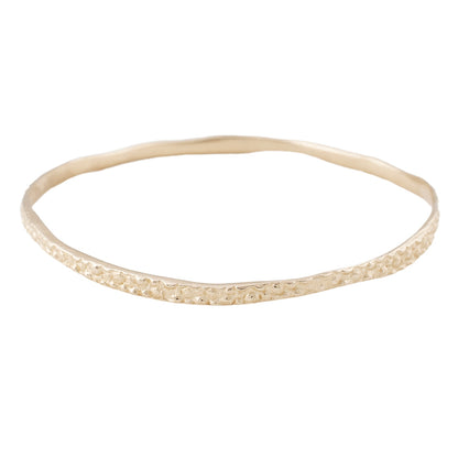 14k Gold Stingray Bangle from Lauren Wolf Jewelry against a white background