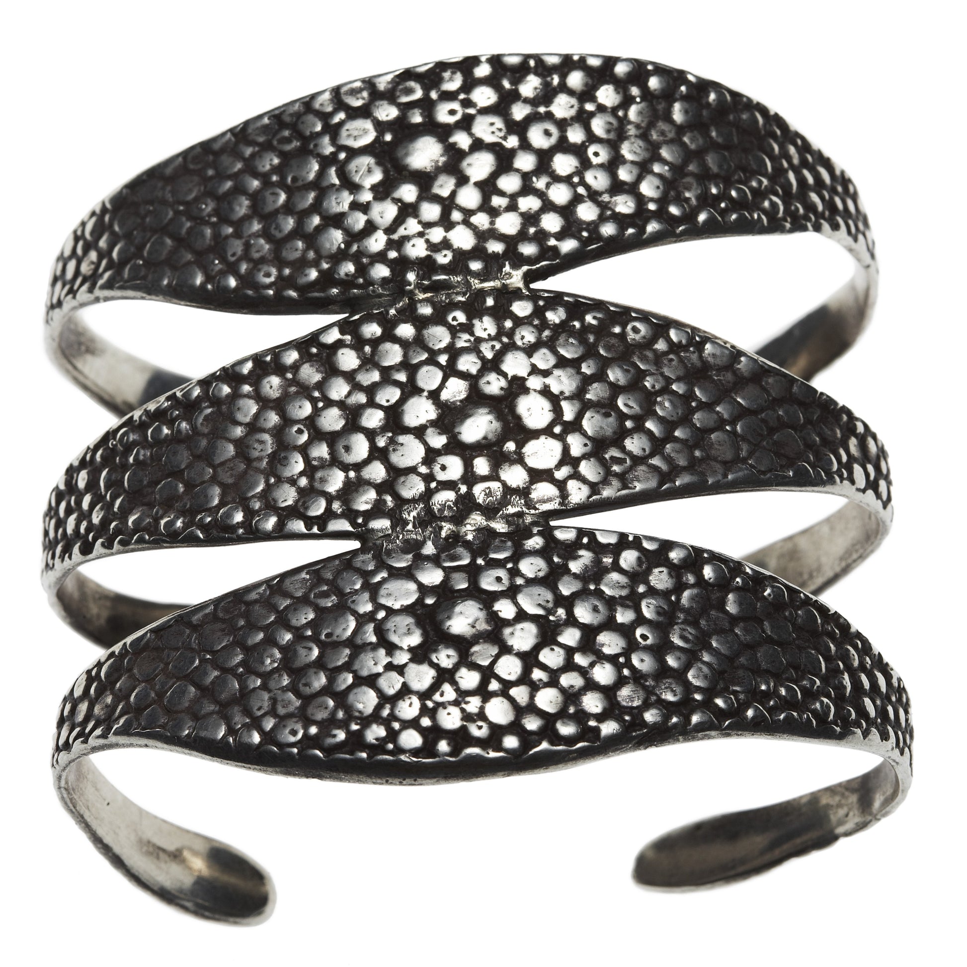 Stingray Triple Cuff by Lauren Wolf Jewelry against a white backdrop