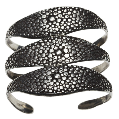 Stingray Triple Cuff by Lauren Wolf Jewelry against a white backdrop