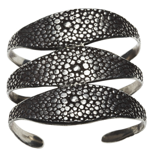 Stingray Triple Cuff by Lauren Wolf Jewelry against a white backdrop