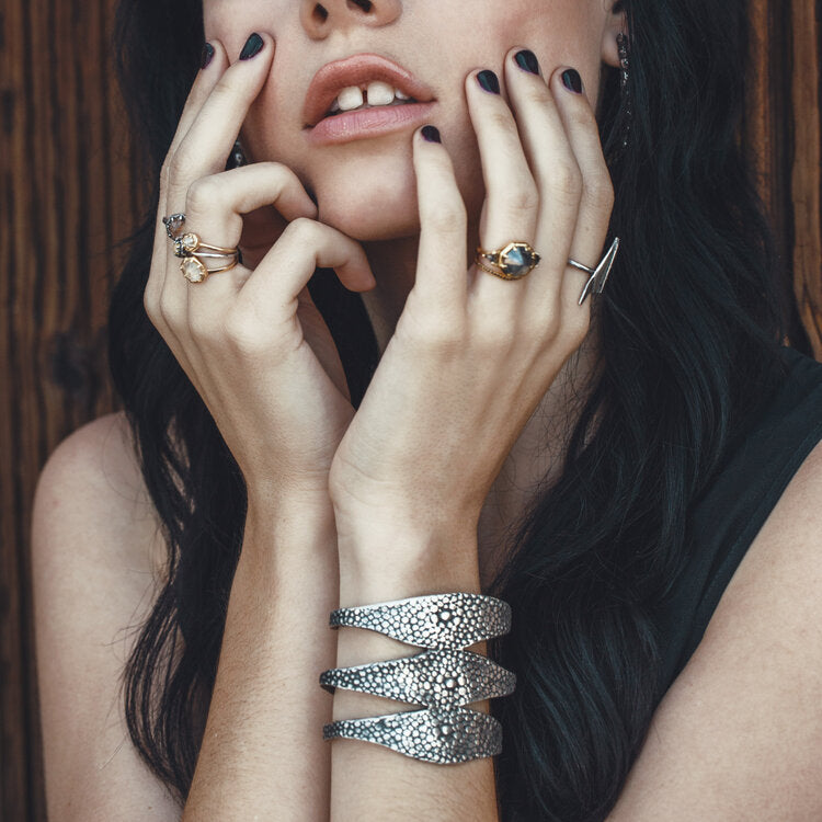 Stingray Triple Cuff by Lauren Wolf Jewelry shown styled on a woman's wrist
