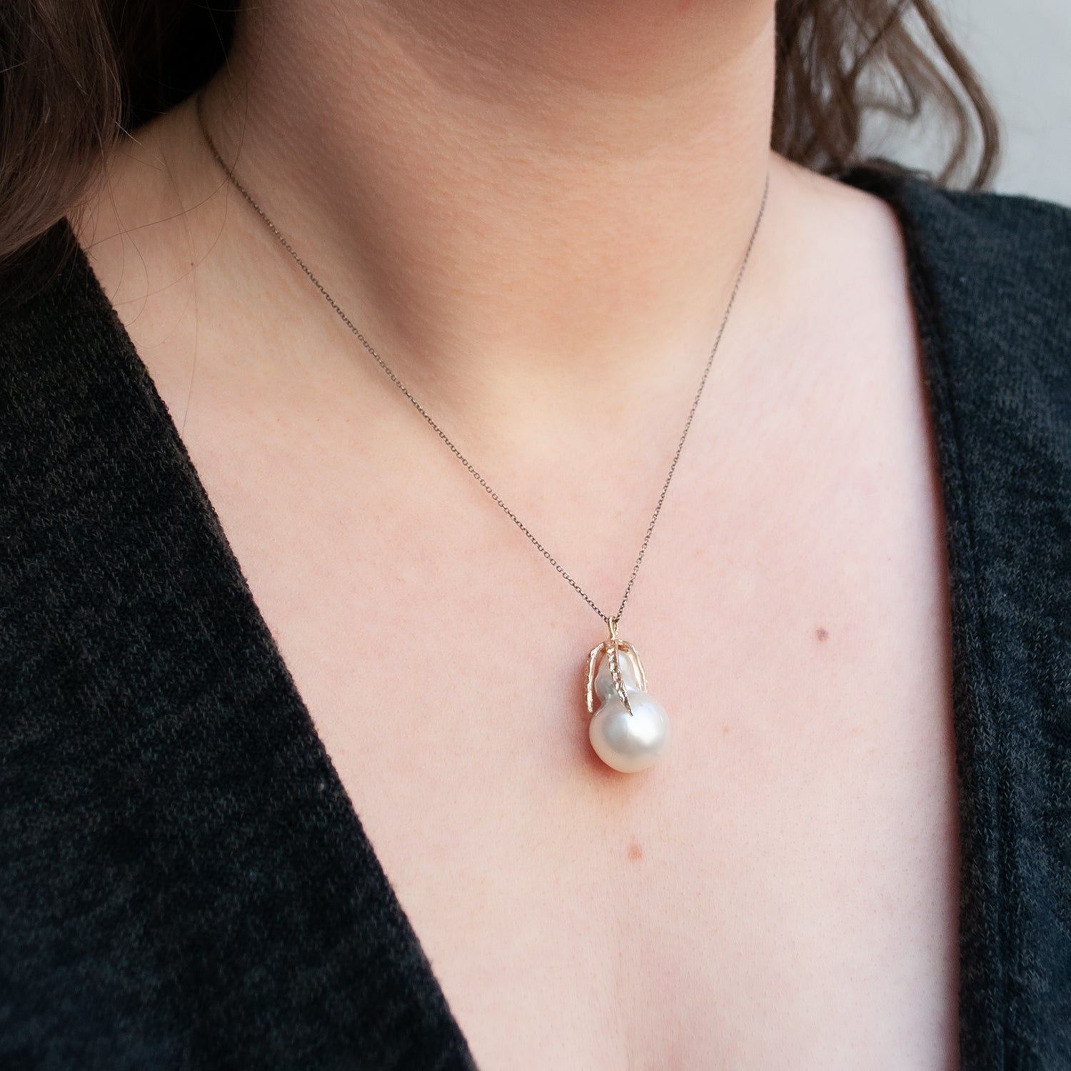 Lauren Wolf Jewelery's White South Sea Pearl Necklace shown worn on the neck