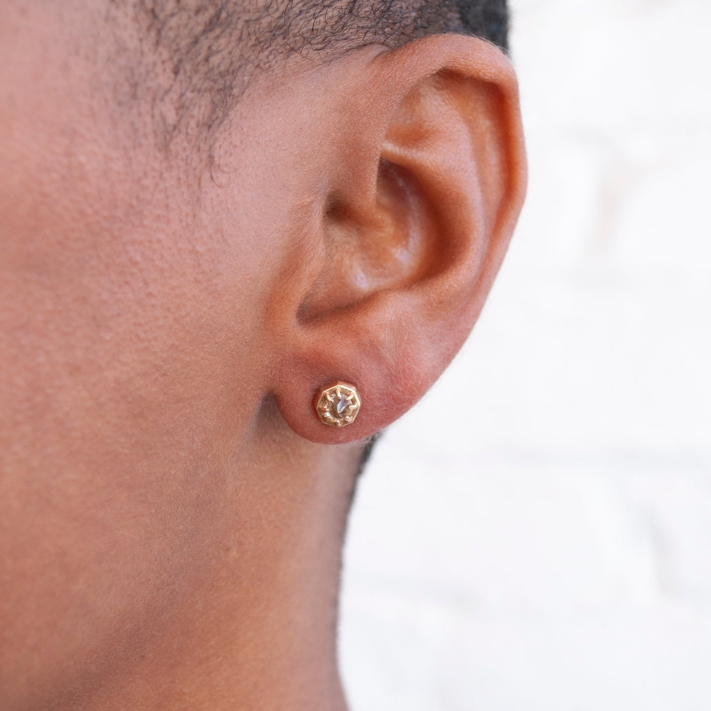 Tiny Rutilated Quartz Quartz Studs by Lauren Wolf Jewelry shown worn on the ear